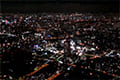 ヘリコプターで大阪上空から見る京橋の夜景
