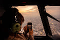 ヘリコプターで東京上空から見る夕焼けの東京